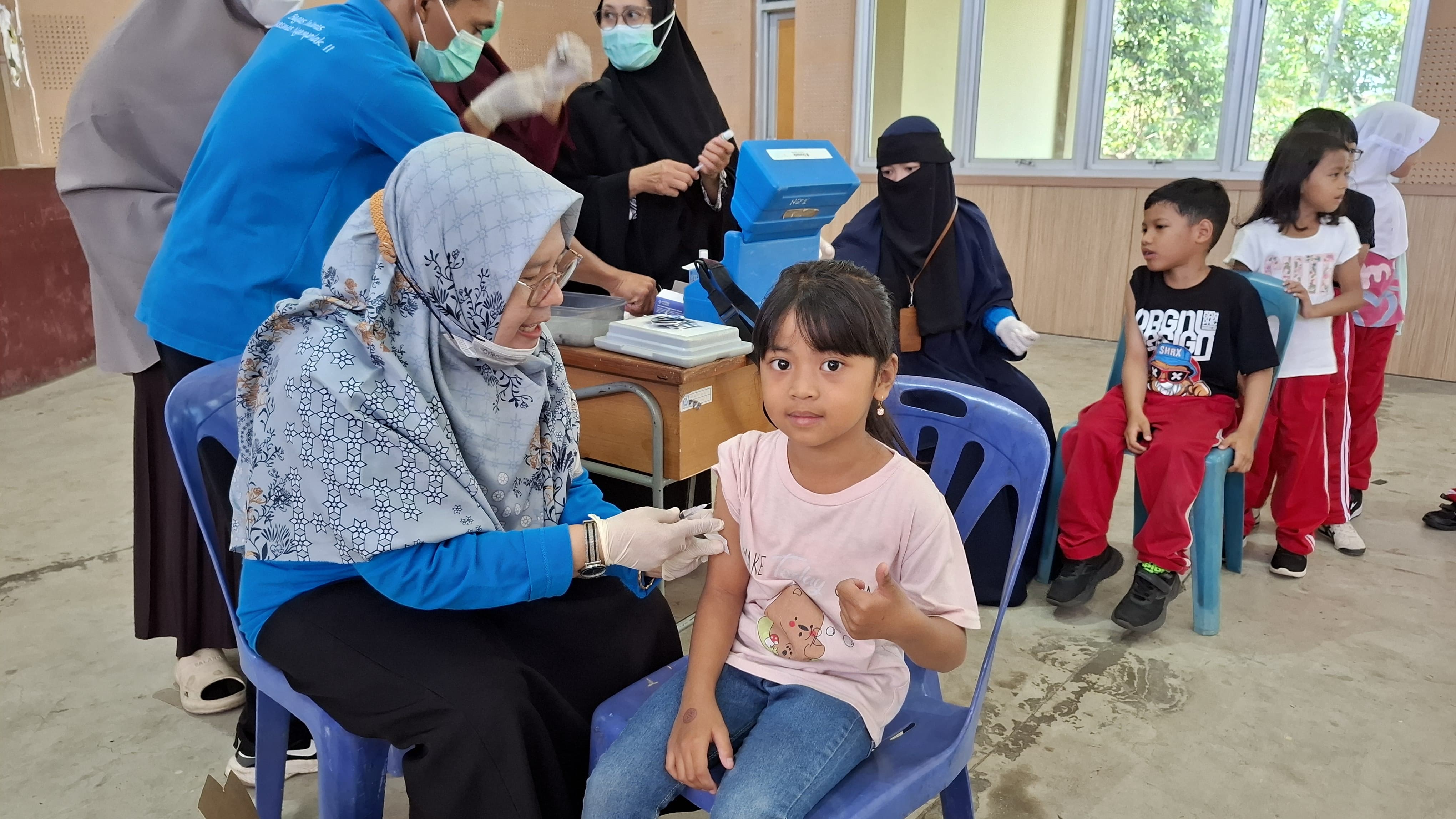 SD Model Sleman Bersama Puskesmas Ngemplak II Gelar Imunisasi JE di Grha Garuda