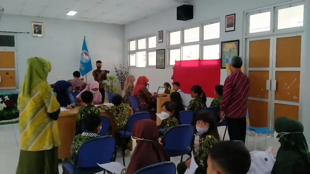 PEREKAMAN KIA OLEH DUKCAPIL SLEMAN DI SD MODEL